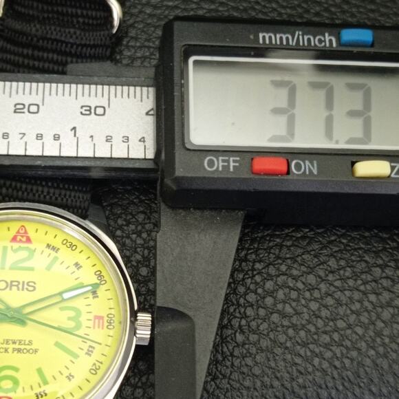 Vintage 1991 Oris Manual Mens Silver Watch W/Nato Strap & Yellow accents - Picture 7 of 9